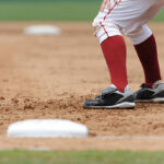 baseball player leading off first