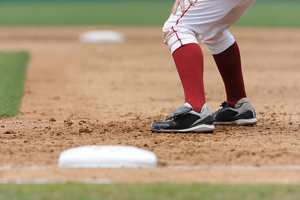 baseball player leading off first