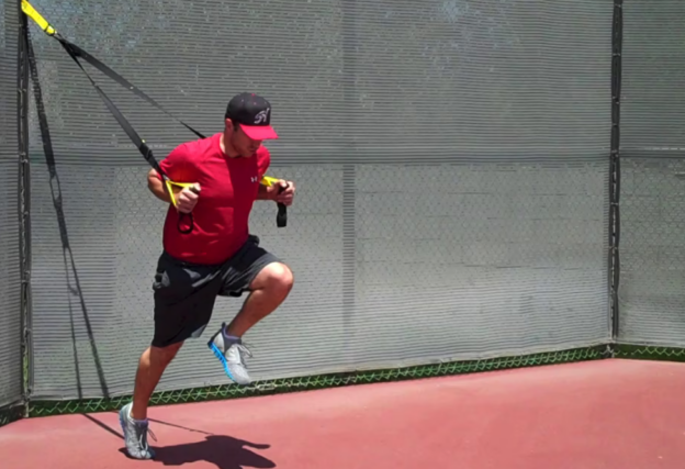 Baseball player performing an explosive exercise to improve sport-specific power.